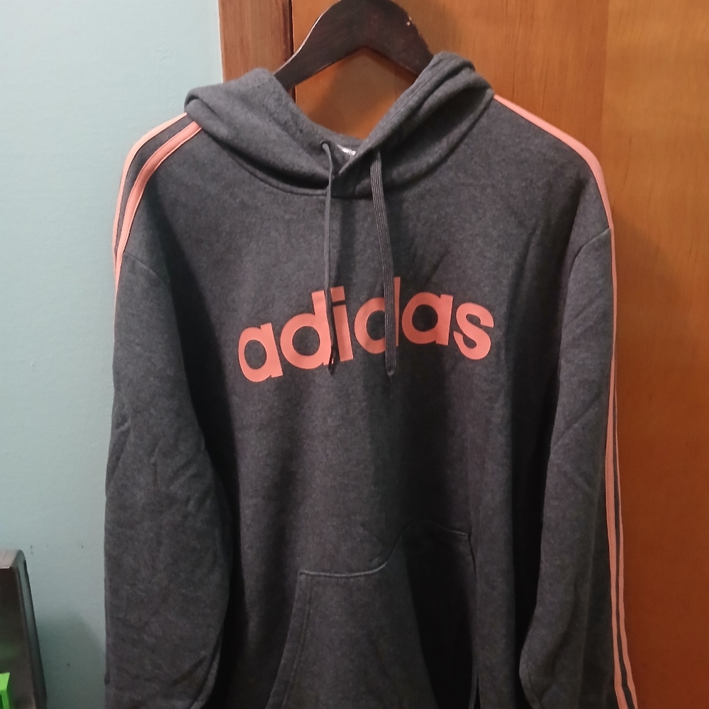 Adidas fleece hoodie with orange logo and stripes